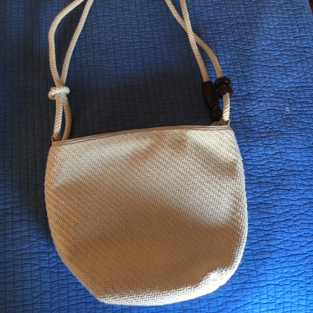 Woven purse with leather and wood details